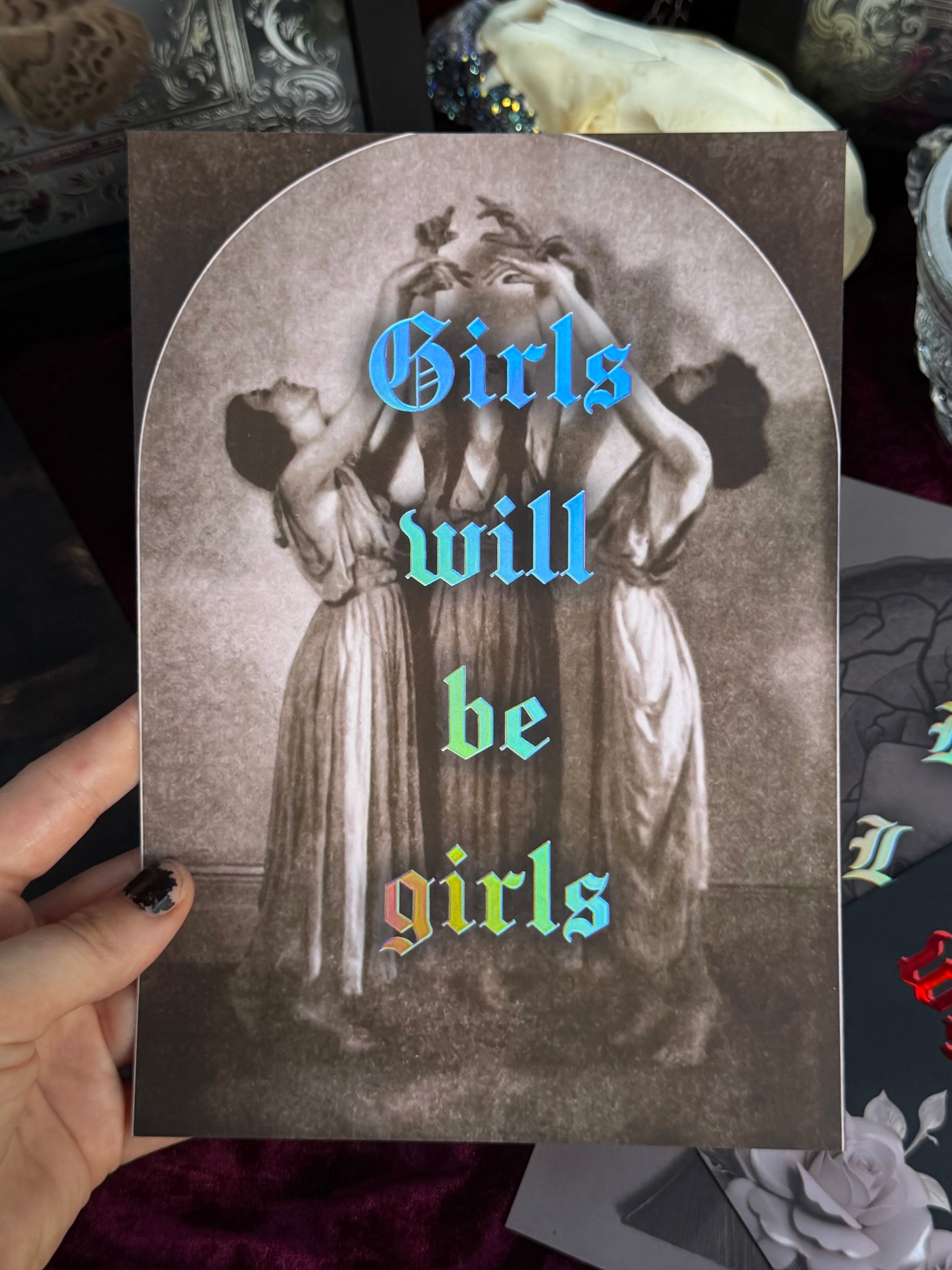 Card with vintage-style illustration of three women and 'Girls will be girls' text.